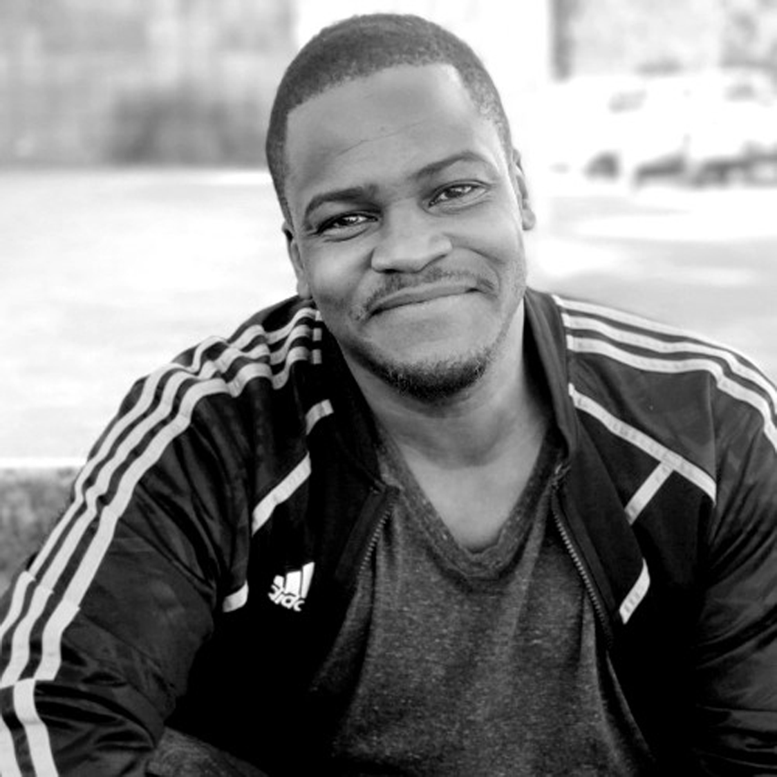 confident-ginger-man-with-trendy-hairstyle-wears-spectacles-looks-directly 1-1